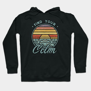 A vibrant sunset over a serene lake with the quote ‘Find Your Calm’ Hoodie